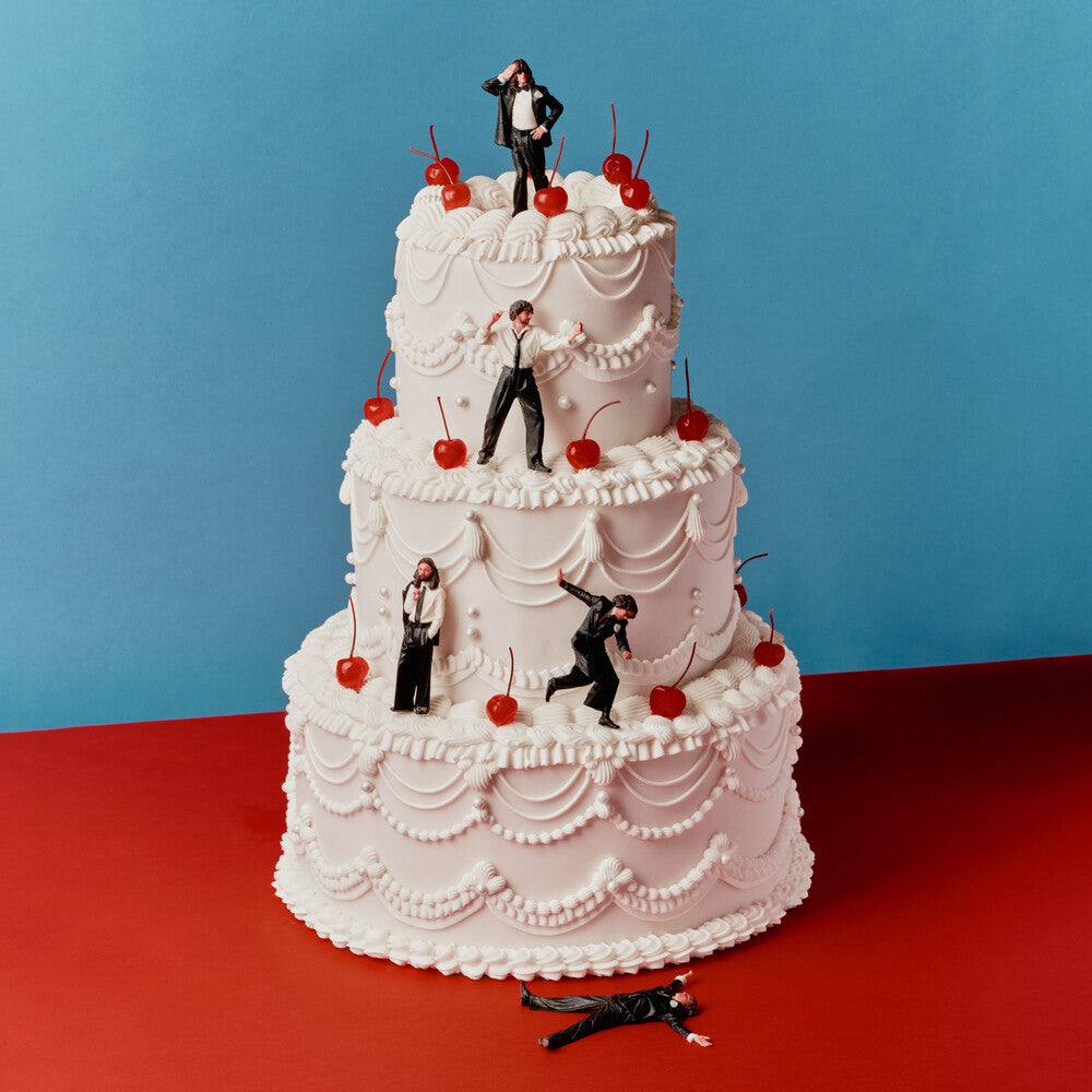 the album cover for Blossoms - Songs From The Wedding Cake