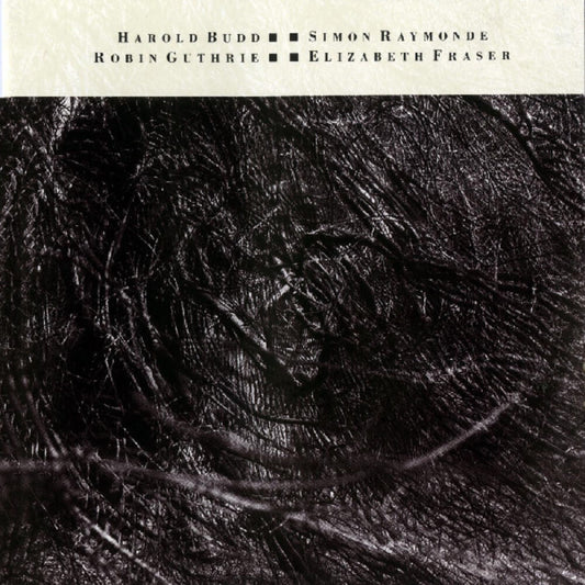 the album cover for Cocteau Twins and Harold Budd - The Moon and the Melodies [LP]