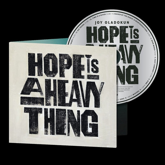 the album cover for Joy Oladokun - Hope Is A Heavy Thing