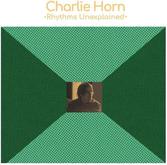 the album cover for Charlie Horn - Rhythms Unexplained [Colored Vinyl] (Grn)